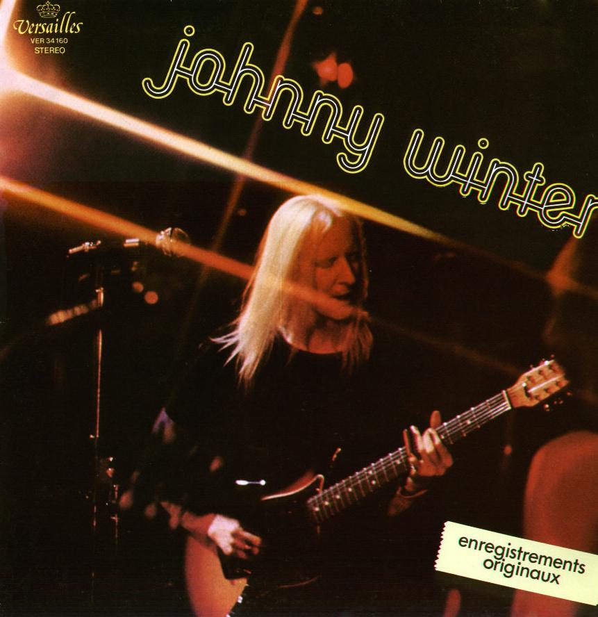Johnny Winter playing slide guitar